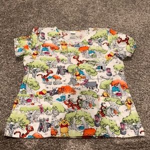 Winnie the Pooh Disney brand scrub top.